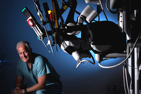Dr. Thomas E. Ahlering with surgical robot